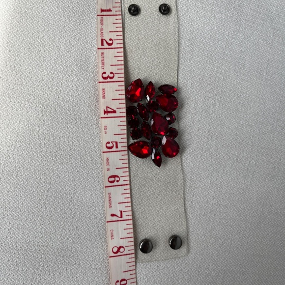 Cuff bracelet in faux red 'stones' and clear plastic. - Picture 13 of 15
